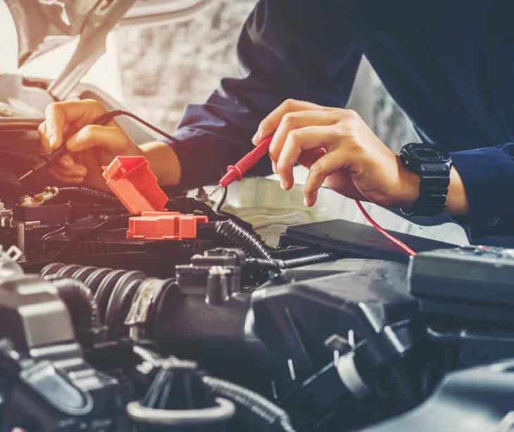 Car technician checks engine — Experienced Mechanics in Tamworth, NSW